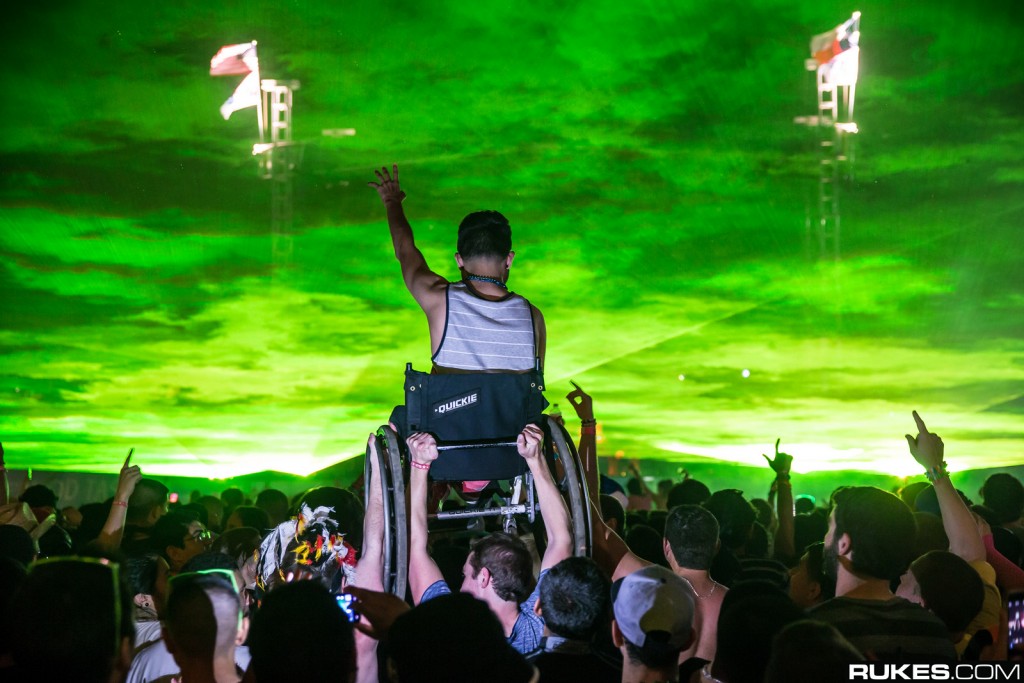 UME audience raises up a man in a wheelchair under lasers!